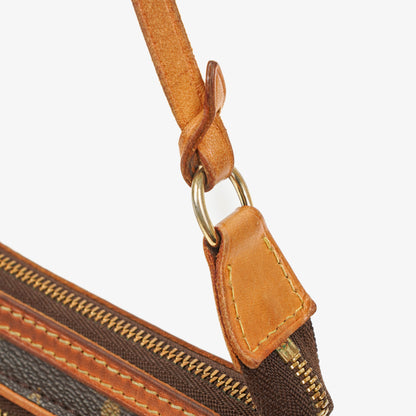 Louis Vuitton Riveting Limited Edition Pochette Accessories Clutch aus Monogram beschichtetem Canvas