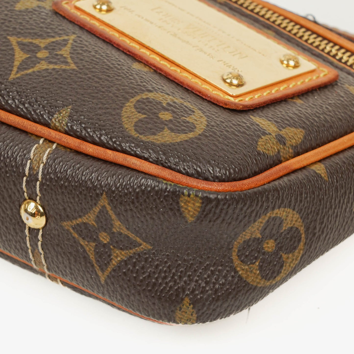 Louis Vuitton Riveting Limited Edition Pochette Accessories Clutch aus Monogram beschichtetem Canvas