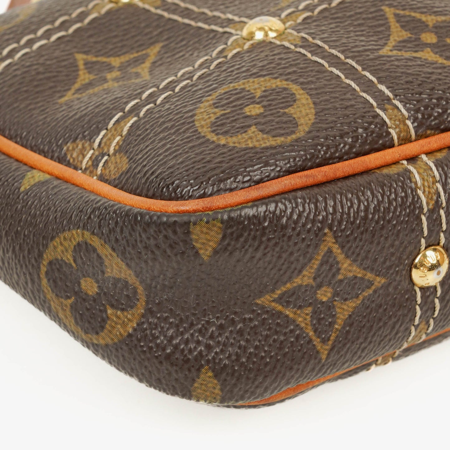 Louis Vuitton Riveting Limited Edition Pochette Accessories Clutch aus Monogram beschichtetem Canvas