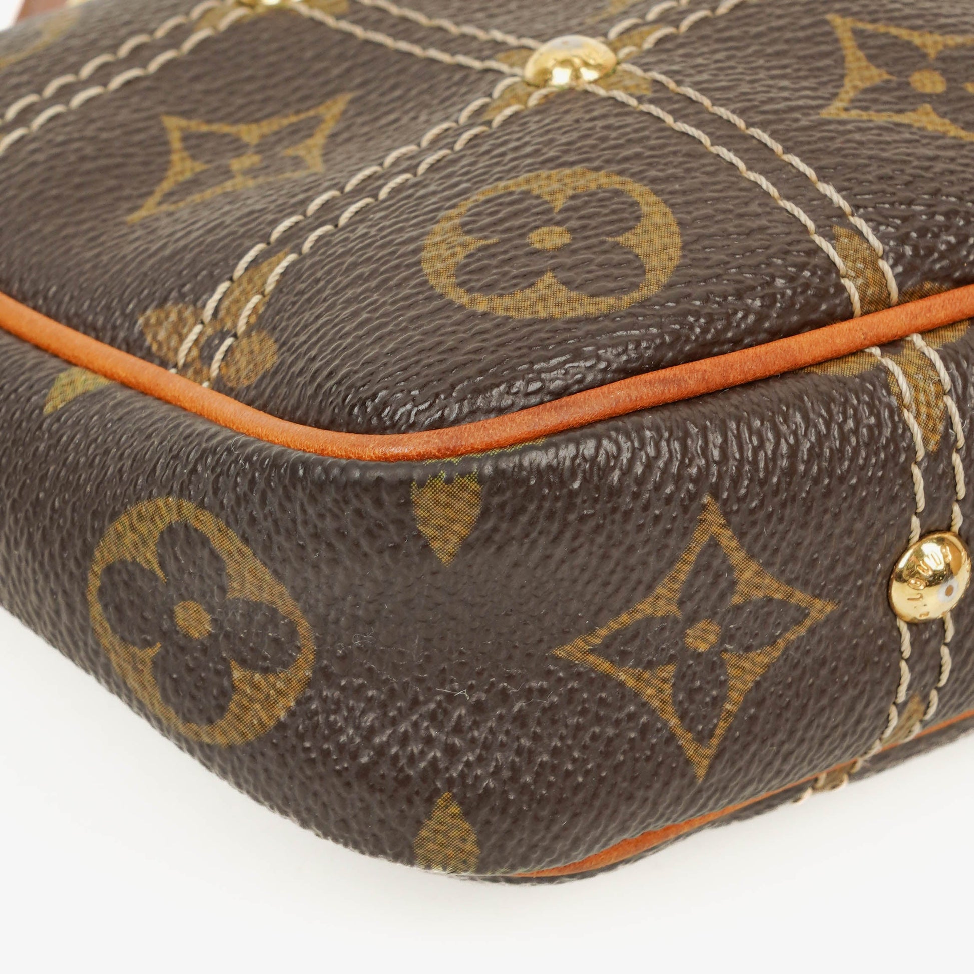 Louis Vuitton Riveting Limited Edition Pochette Accessories Clutch aus Monogram beschichtetem Canvas