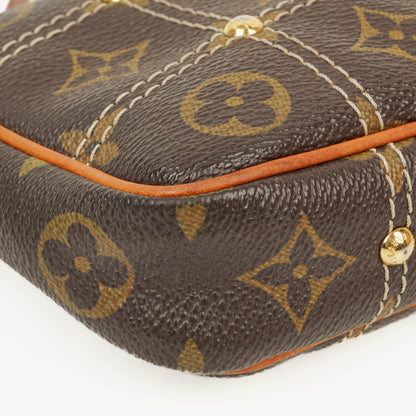 Louis Vuitton Riveting Limited Edition Pochette Accessories Clutch aus Monogram beschichtetem Canvas