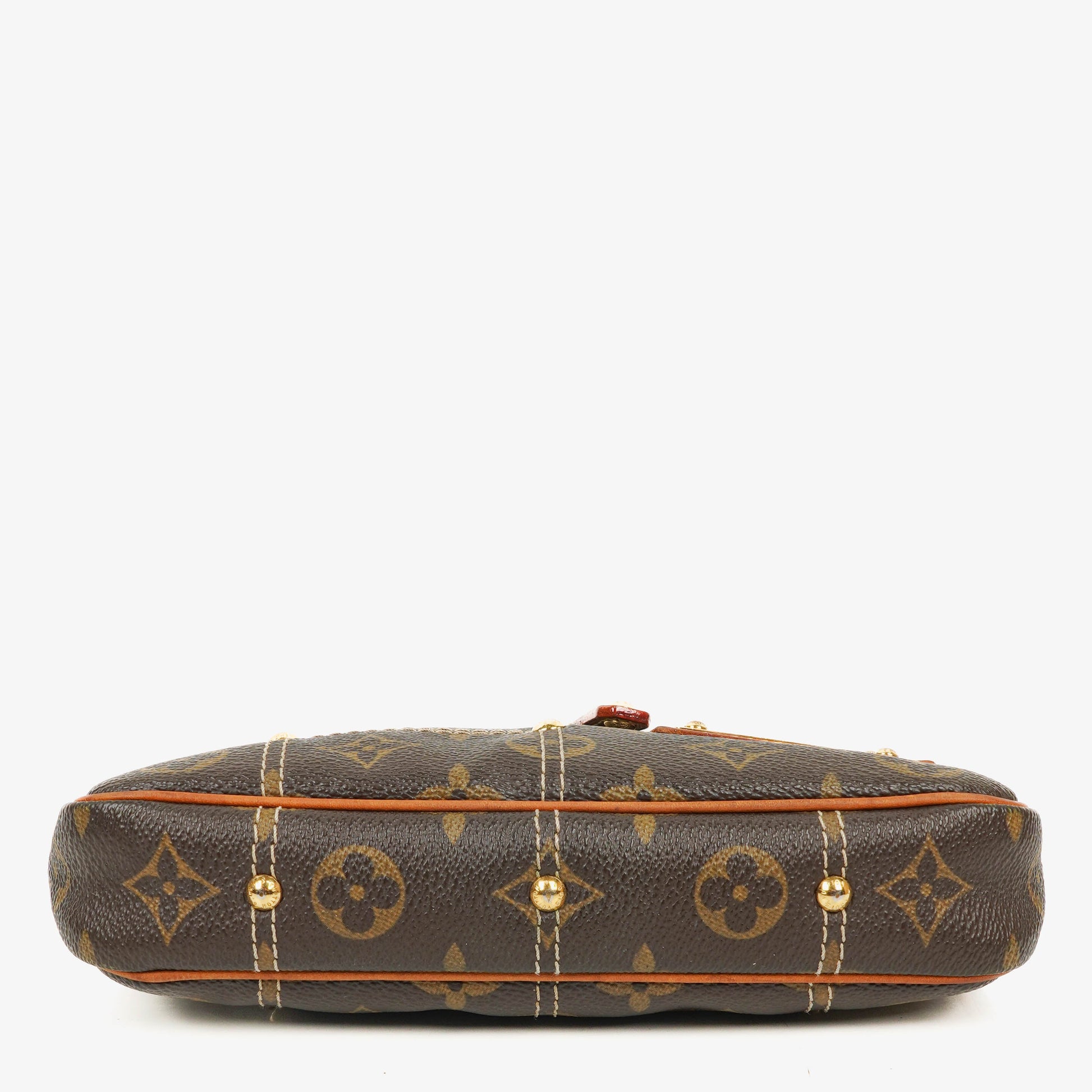 Louis Vuitton Riveting Limited Edition Pochette Accessories Clutch aus Monogram beschichtetem Canvas