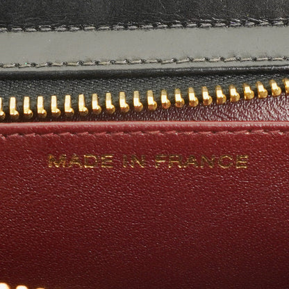 Chanel Handgelenktasche aus schwarzem Lackleder mit CC-Logo