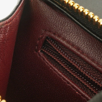 Chanel Handgelenktasche aus schwarzem Lackleder mit CC-Logo