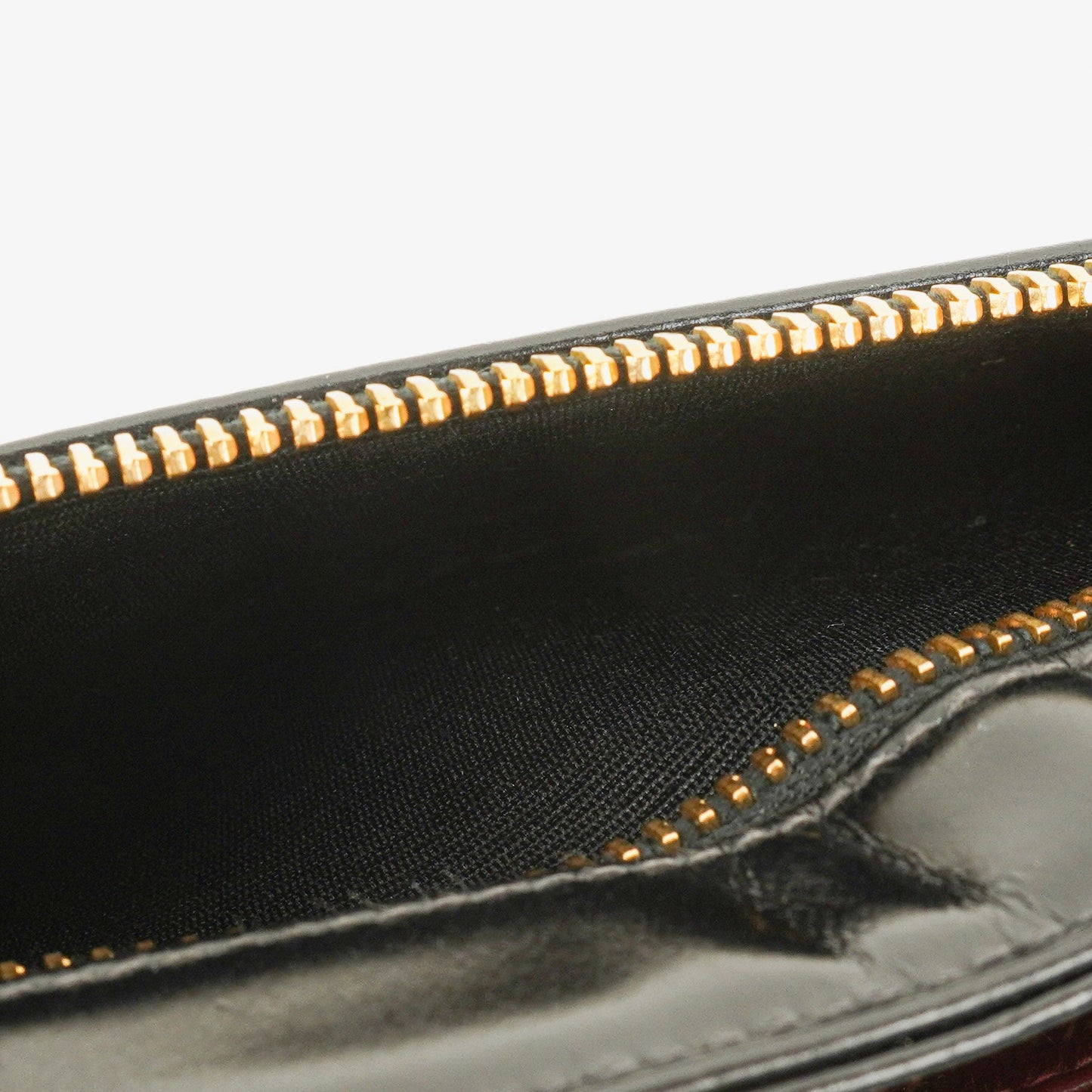 Chanel Handgelenktasche aus schwarzem Lackleder mit CC-Logo