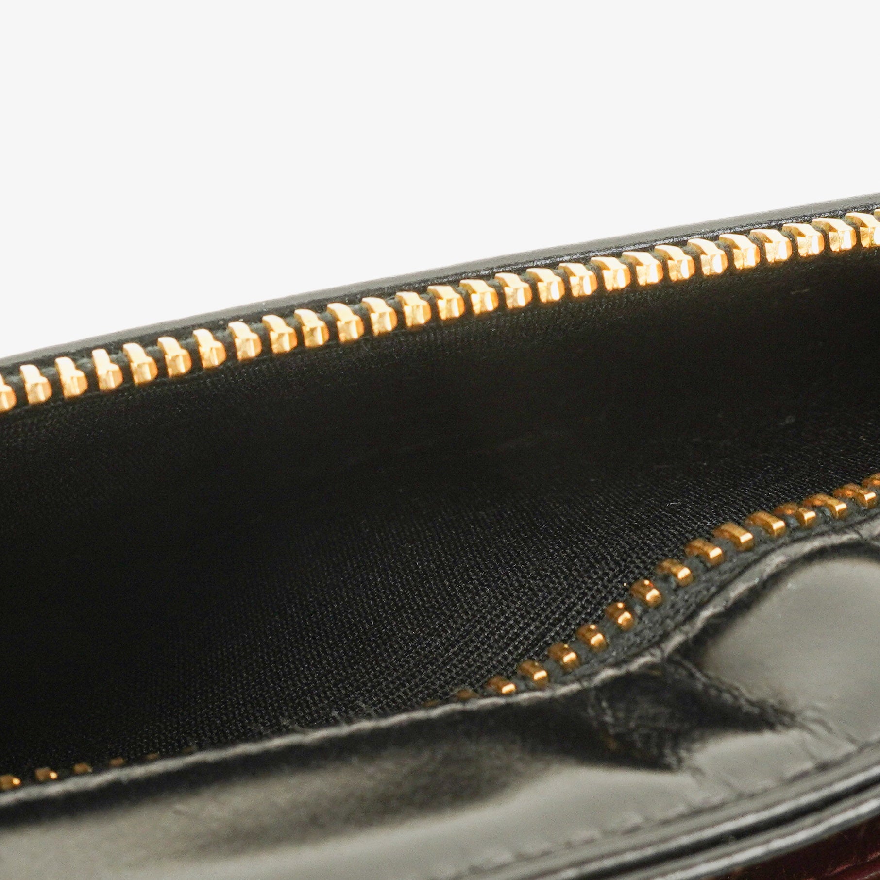 Chanel Handgelenktasche aus schwarzem Lackleder mit CC-Logo