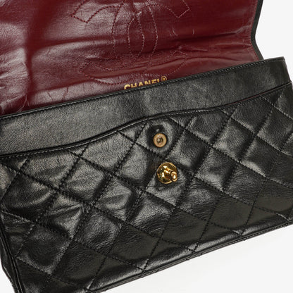 Chanel Paris Classic Medium Double Flap Bag aus schwarzem gestepptem Lammleder mit gold- und silberfarbener Combo-Hardware