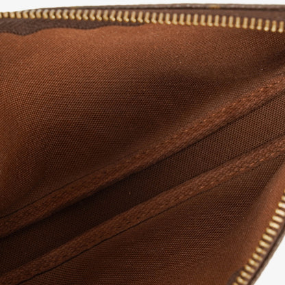 Louis Vuitton Mini Pochette Accessoires Clutch aus Monogram Canvas