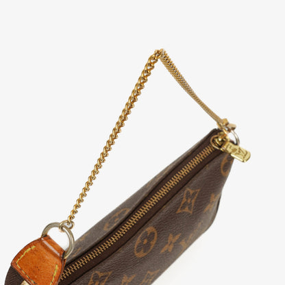 Louis Vuitton Mini Pochette Accessoires Clutch aus Monogram Canvas