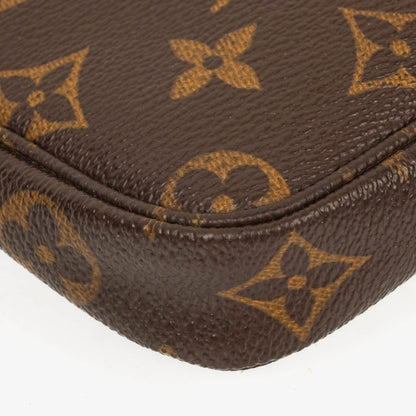 Louis Vuitton Mini Pochette Accessoires Clutch aus Monogram Canvas