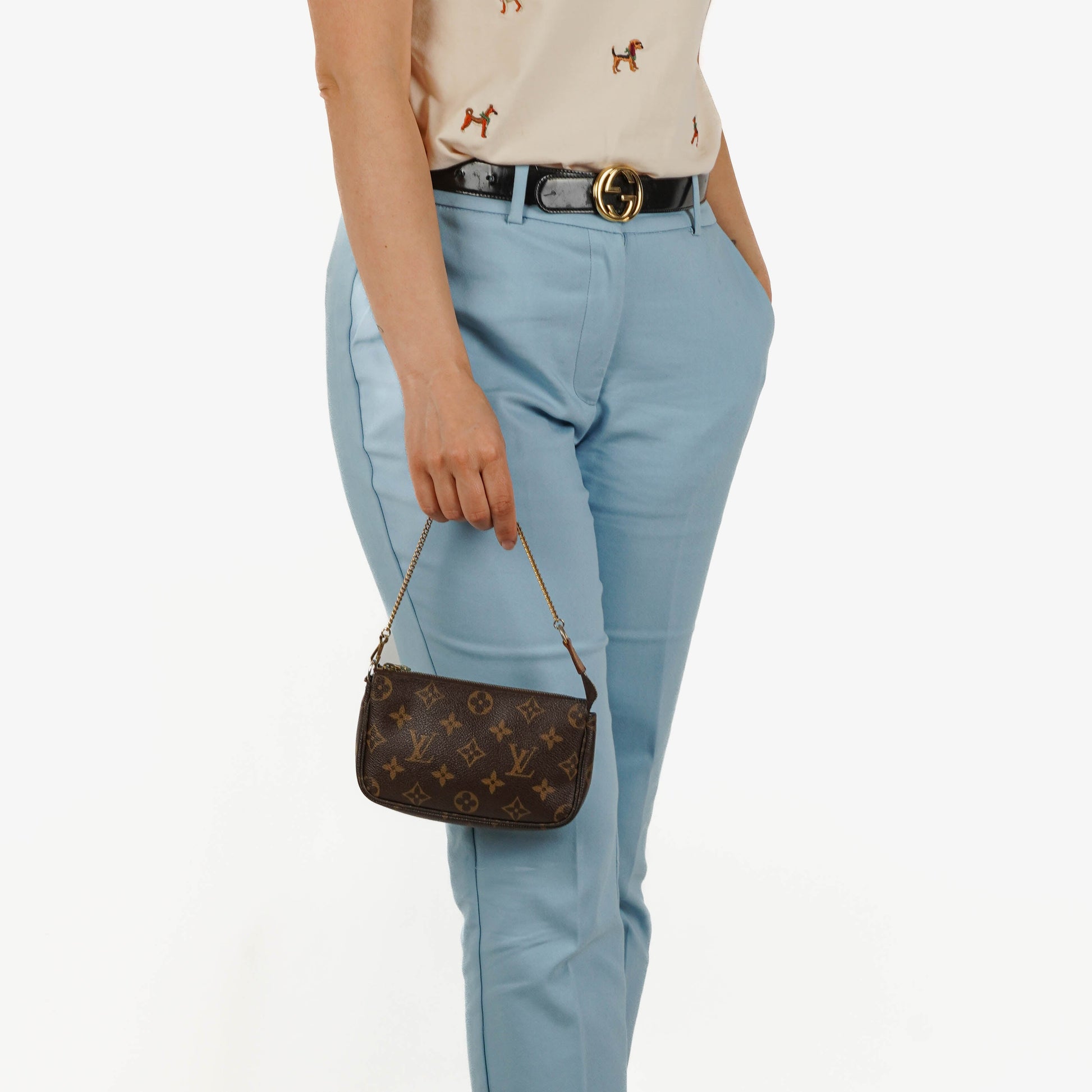 Louis Vuitton Mini Pochette Accessoires Clutch aus Monogram Canvas