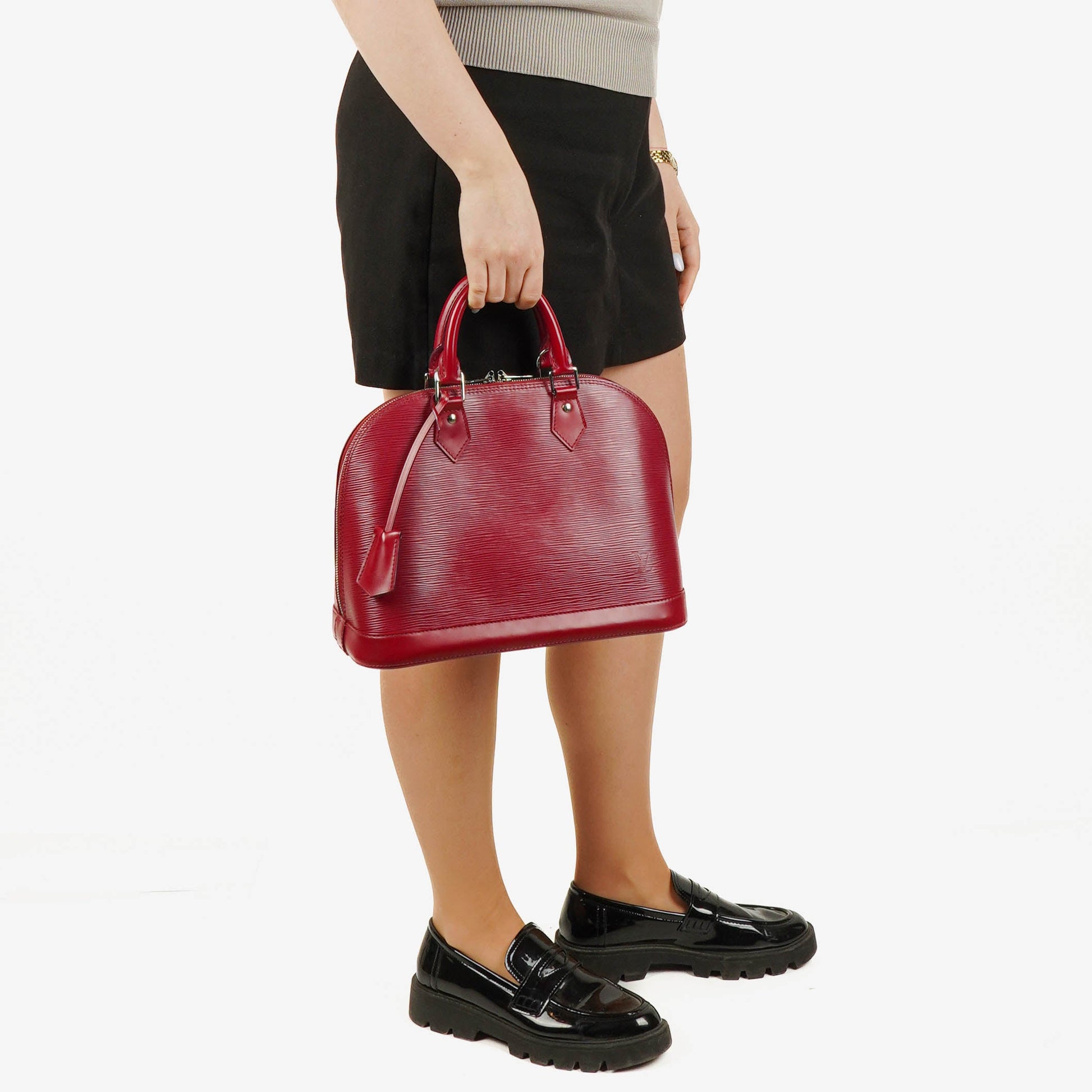 Louis Vuitton Alma PM Handtasche aus fuchsiafarbenem Epi Leder
