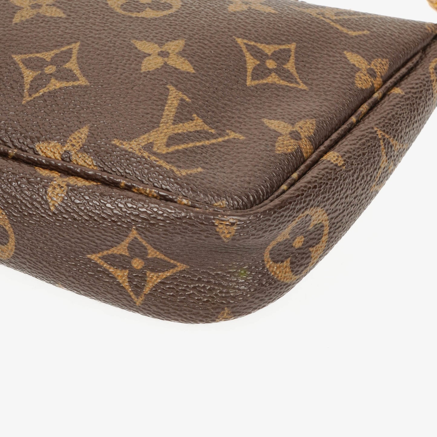 Louis Vuitton Pochette Accessoires Monogram Canvas Clutch-Handtasche