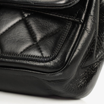 CHANEL Single Flap Bag aus schwarzem gestepptem Leder