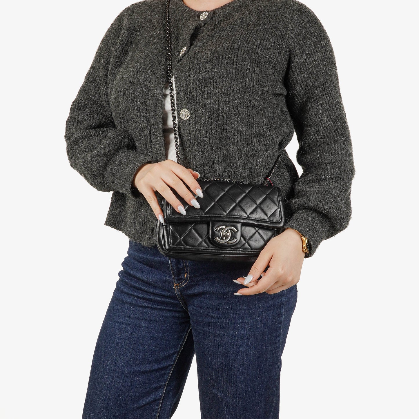 CHANEL Single Flap Bag aus schwarzem gestepptem Leder