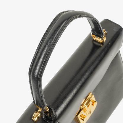 Gucci Vintage Lady Lock Tasche aus glänzendem schwarzem Leder