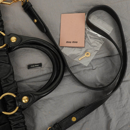Miu Miu Vitello Satchel Tasche in Schwarz