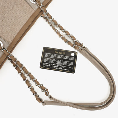 Chanel North/South Deauville Shopping Tote aus beigem Canvas