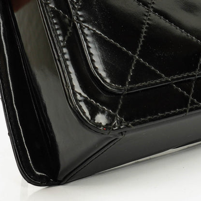 Chanel Top-Handle-Klappentasche aus schwarzem gestepptem Lackleder mit 24K vergoldeter Hardware
