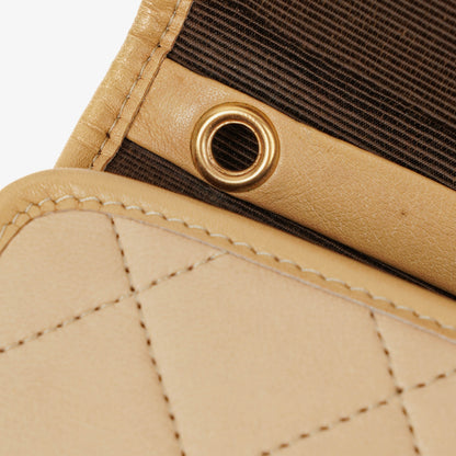 CHANEL Mini Flap Bag aus beigem gestepptem Lammleder mit 24K vergoldeten Beschlägen