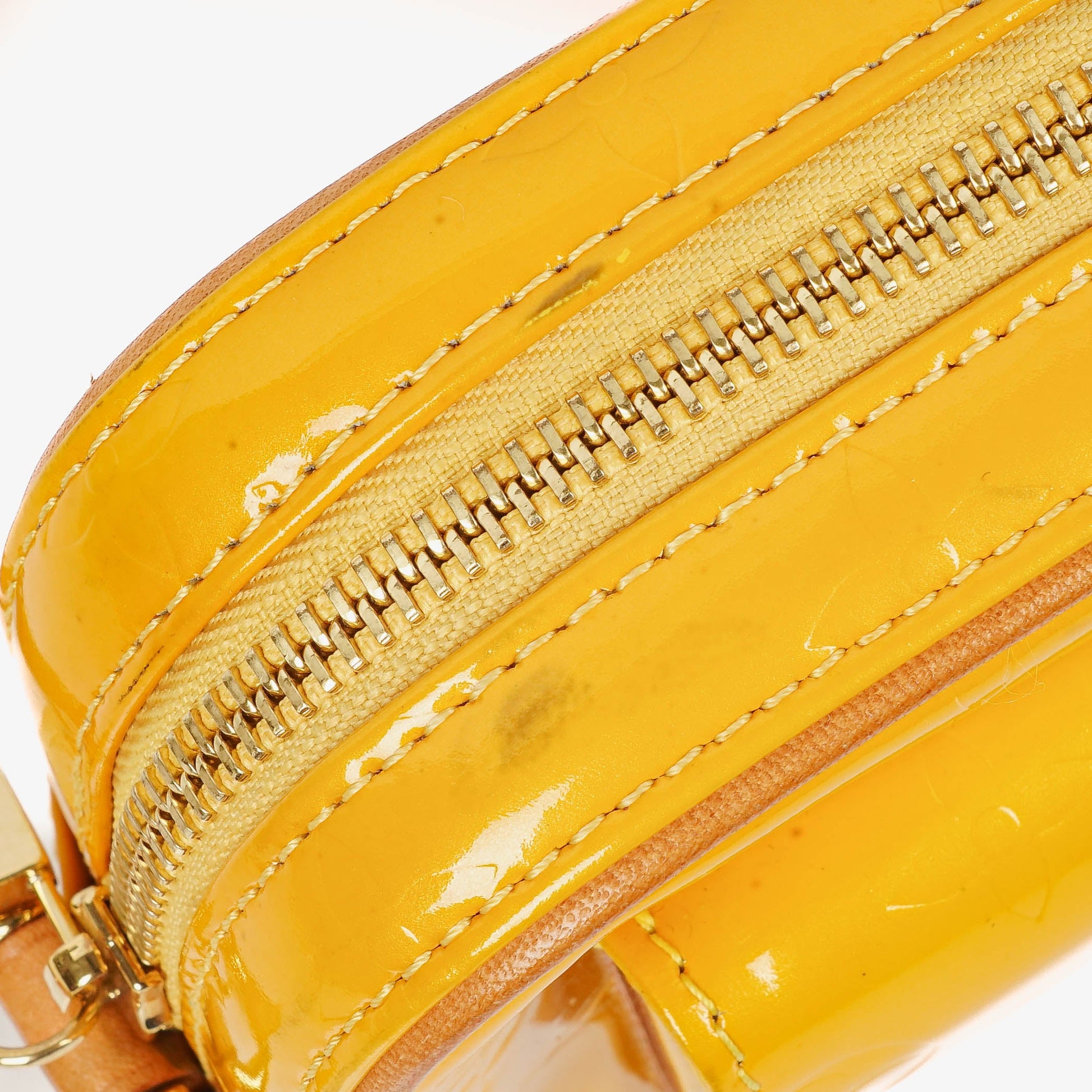 Louis Vuitton Christie Monogram aus gelbem Monogram Vernis