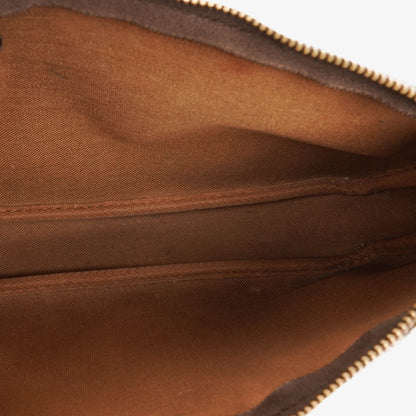 Louis Vuitton Pochette Accessoires Clutch-Handtasche aus Monogram Canvas