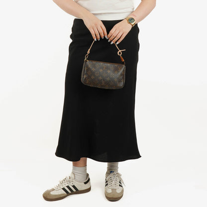 Louis Vuitton Pochette Accessoires Clutch-Handtasche aus Monogram Canvas