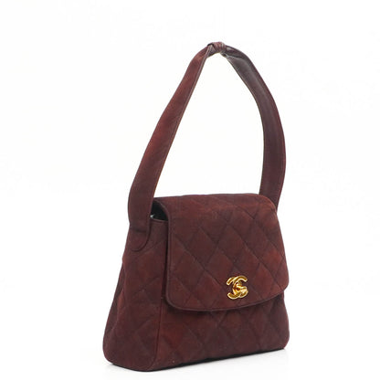 Chanel Vintage Klappentasche aus gestepptem burgunderrotem Wildleder mit 24K vergoldeten Beschlägen