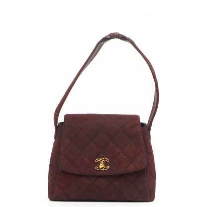 Chanel Vintage Klappentasche aus gestepptem burgunderrotem Wildleder mit 24K vergoldeten Beschlägen