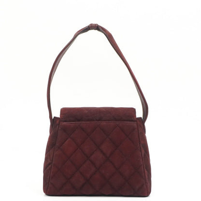 Chanel Vintage Klappentasche aus gestepptem burgunderrotem Wildleder mit 24K vergoldeten Beschlägen