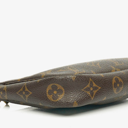 Louis Vuitton Pochette Accessoires Clutch aus Monogram Canvas