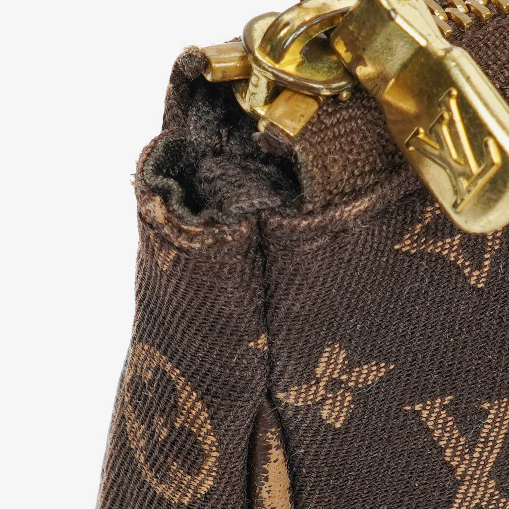 Louis Vuitton Pochette Accessoires Clutch aus Monogram Canvas