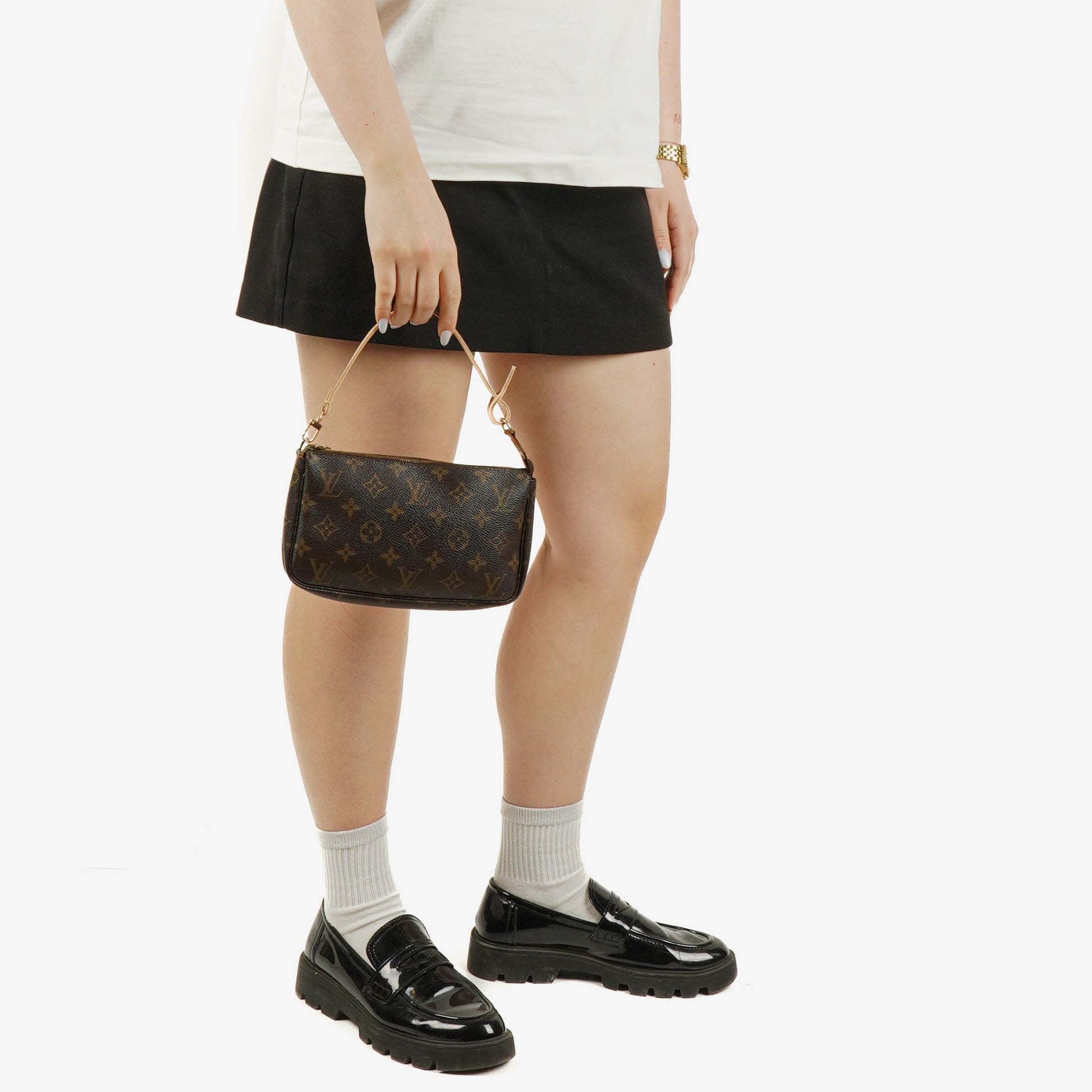 Louis Vuitton Pochette Accessoires Clutch aus Monogram Canvas