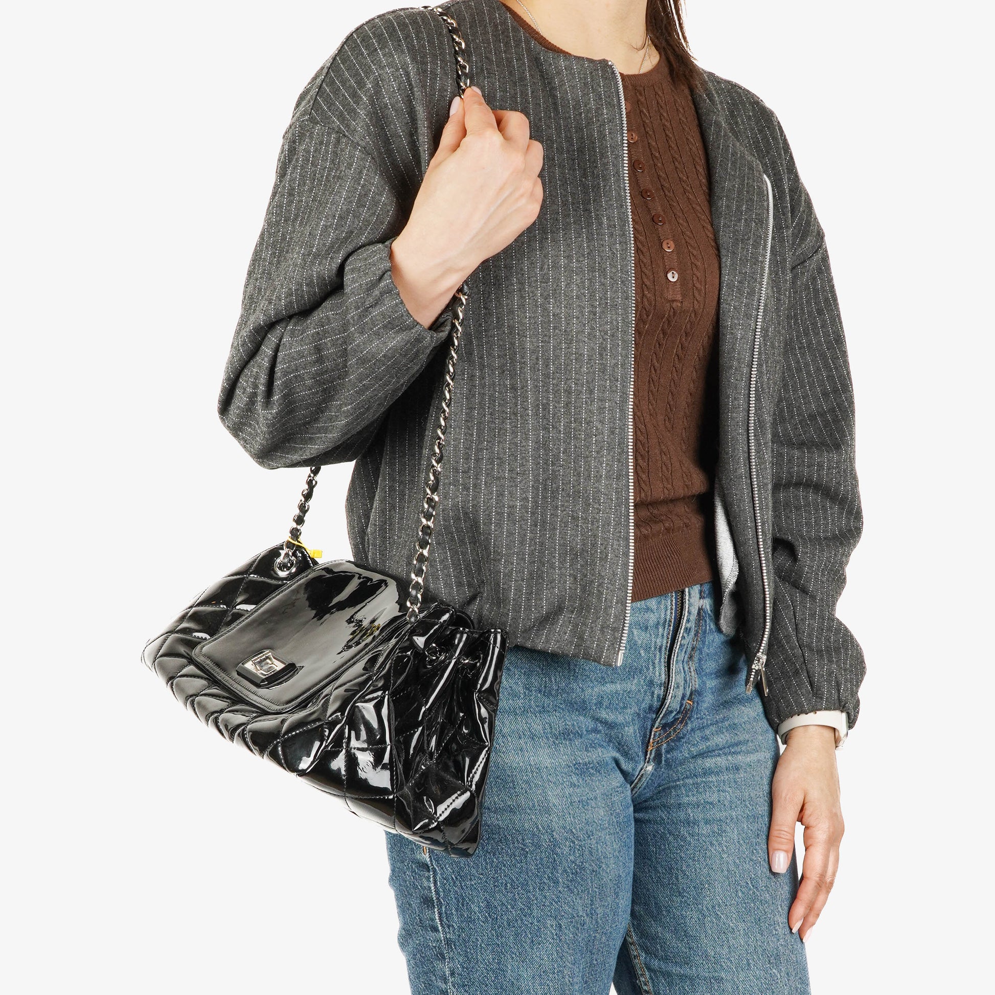 Chanel Reissue Akkordeon Flap Tasche aus schwarzem gestepptem Lackleder