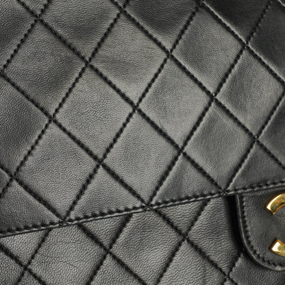 Chanel Vintage Medium Timeless Classic Double Flap Tasche aus schwarzem gestepptem Lammleder mit 24K vergoldeter Hardware und Mademoiselle-Kette