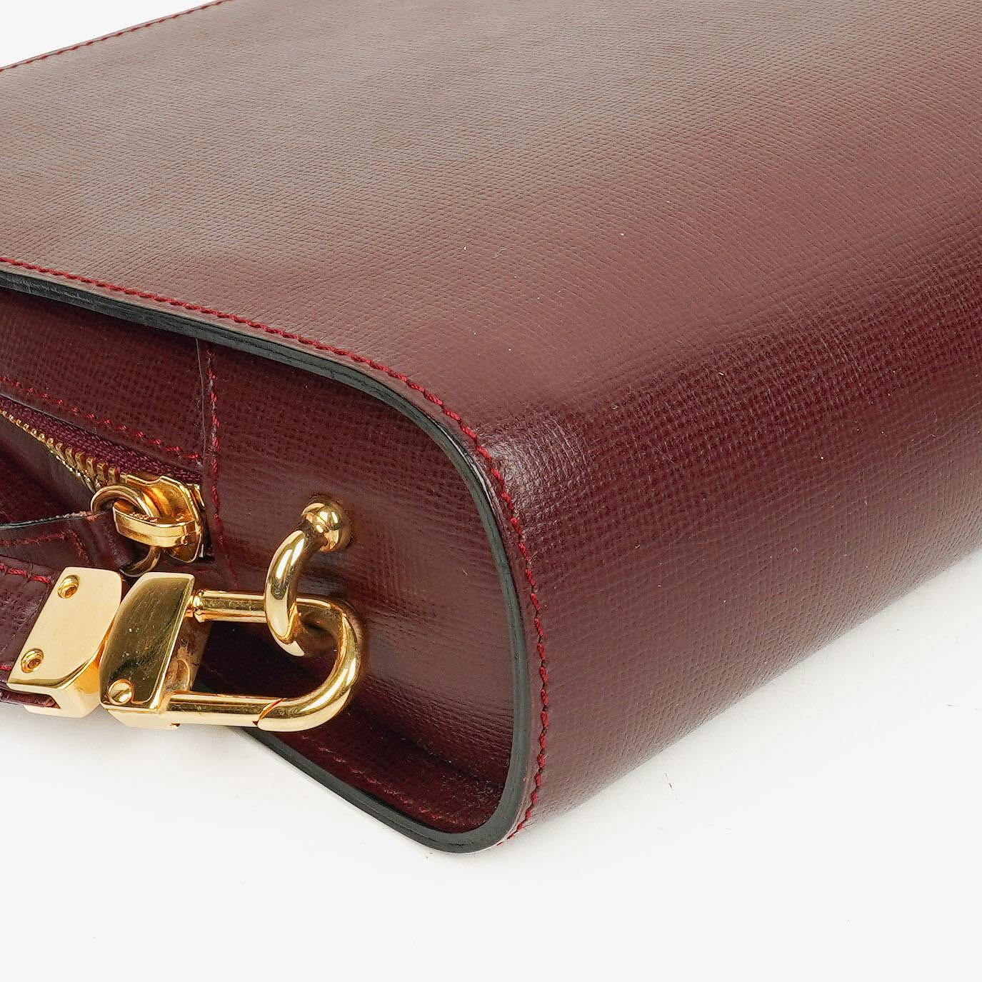 Cartier Must de Cartier Clutch aus burgunderrotem Leder