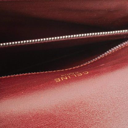 Céline Triomphe Schultertasche aus burgunderfarbenem glänzendem Kalbsleder