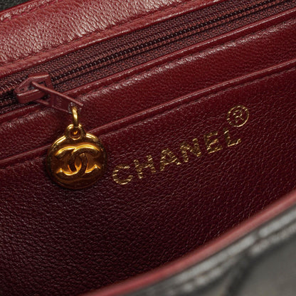 Chanel 2.55 Top-Handle Flap-Tasche aus schwarzem gestepptem Lammleder