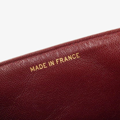 Chanel 2.55 Top-Handle Flap-Tasche aus schwarzem gestepptem Lammleder