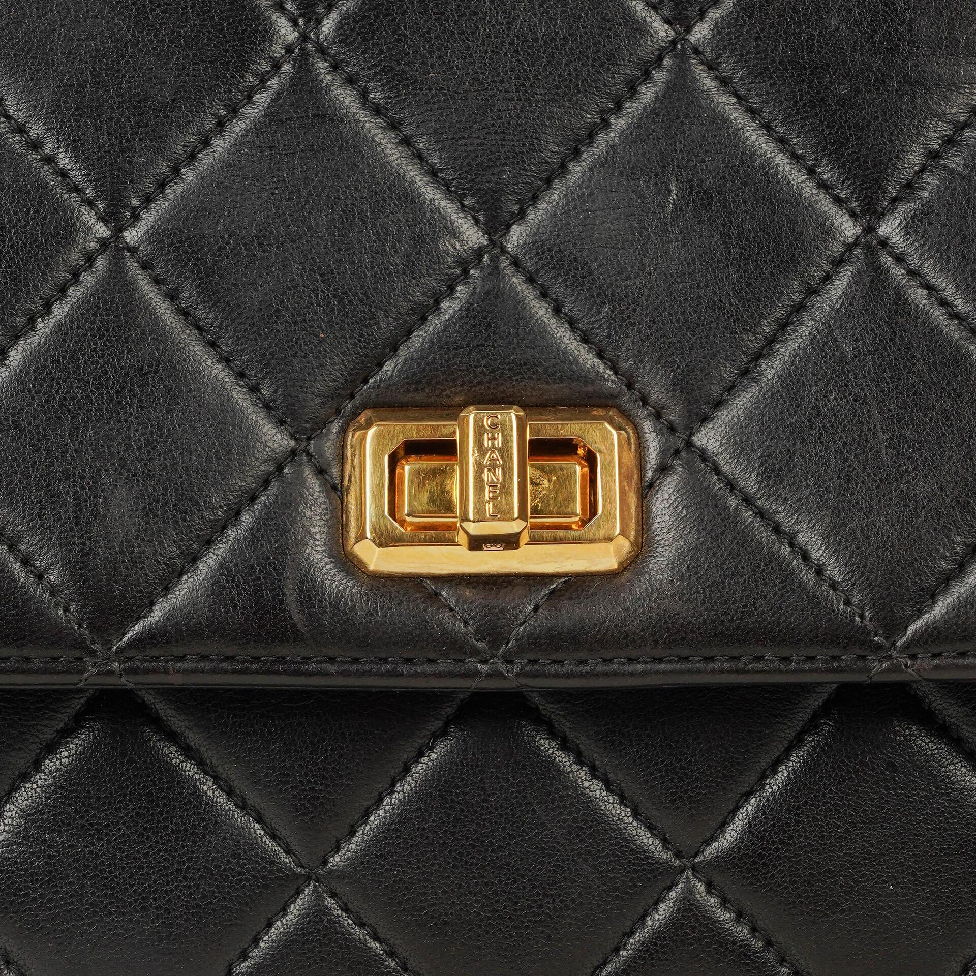 Chanel 2.55 Top-Handle Flap-Tasche aus schwarzem gestepptem Lammleder