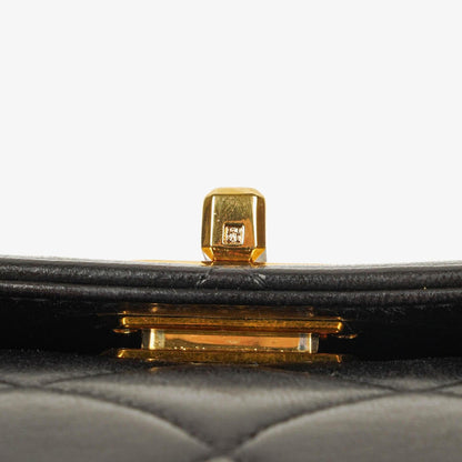 Chanel 2.55 Top-Handle Flap-Tasche aus schwarzem gestepptem Lammleder