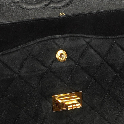 Chanel 2.55 Medium Classic Doppelklappentasche Schwarz Gepolstertes Wildleder Gold Hardware