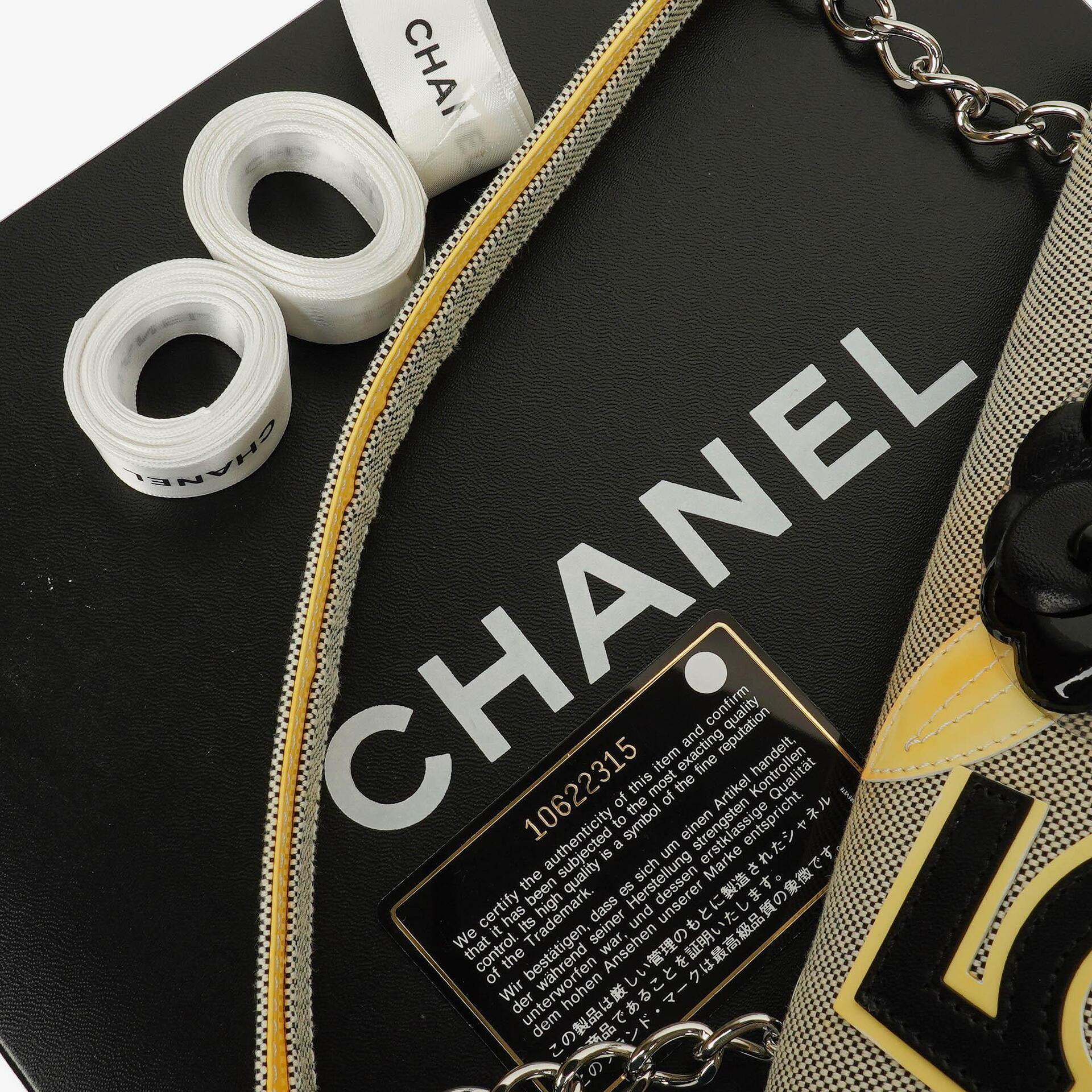 Chanel Camellia N°5 Tasche aus beigem und schwarzem Canvas