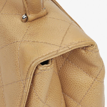 Chanel Jumbo Kelly Flap Bag aus beigem gestepptem Caviar-Leder