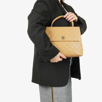 Chanel Jumbo Kelly Flap Bag aus beigem gestepptem Caviar-Leder