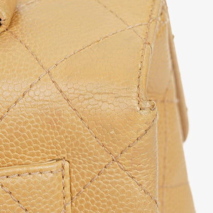 Chanel Jumbo Kelly Flap Bag aus beigem gestepptem Caviar-Leder