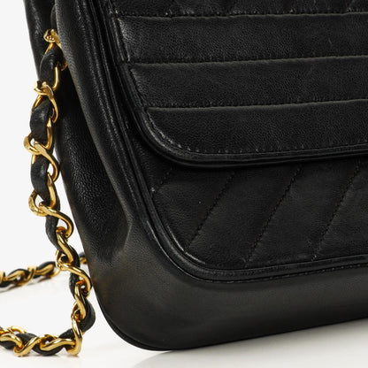 Chanel Schwarze diagonale gesteppte Lammleder Mittel Classic Single Flap Tasche mit 24K vergoldeten Beschlägen