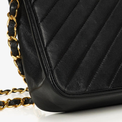 Chanel Schwarze diagonale gesteppte Lammleder Mittel Classic Single Flap Tasche mit 24K vergoldeten Beschlägen