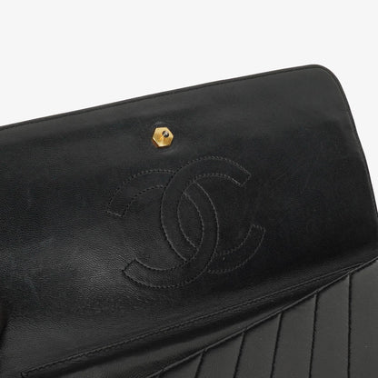 Chanel Schwarze diagonale gesteppte Lammleder Mittel Classic Single Flap Tasche mit 24K vergoldeten Beschlägen