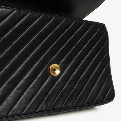 Chanel Schwarze diagonale gesteppte Lammleder Mittel Classic Single Flap Tasche mit 24K vergoldeten Beschlägen